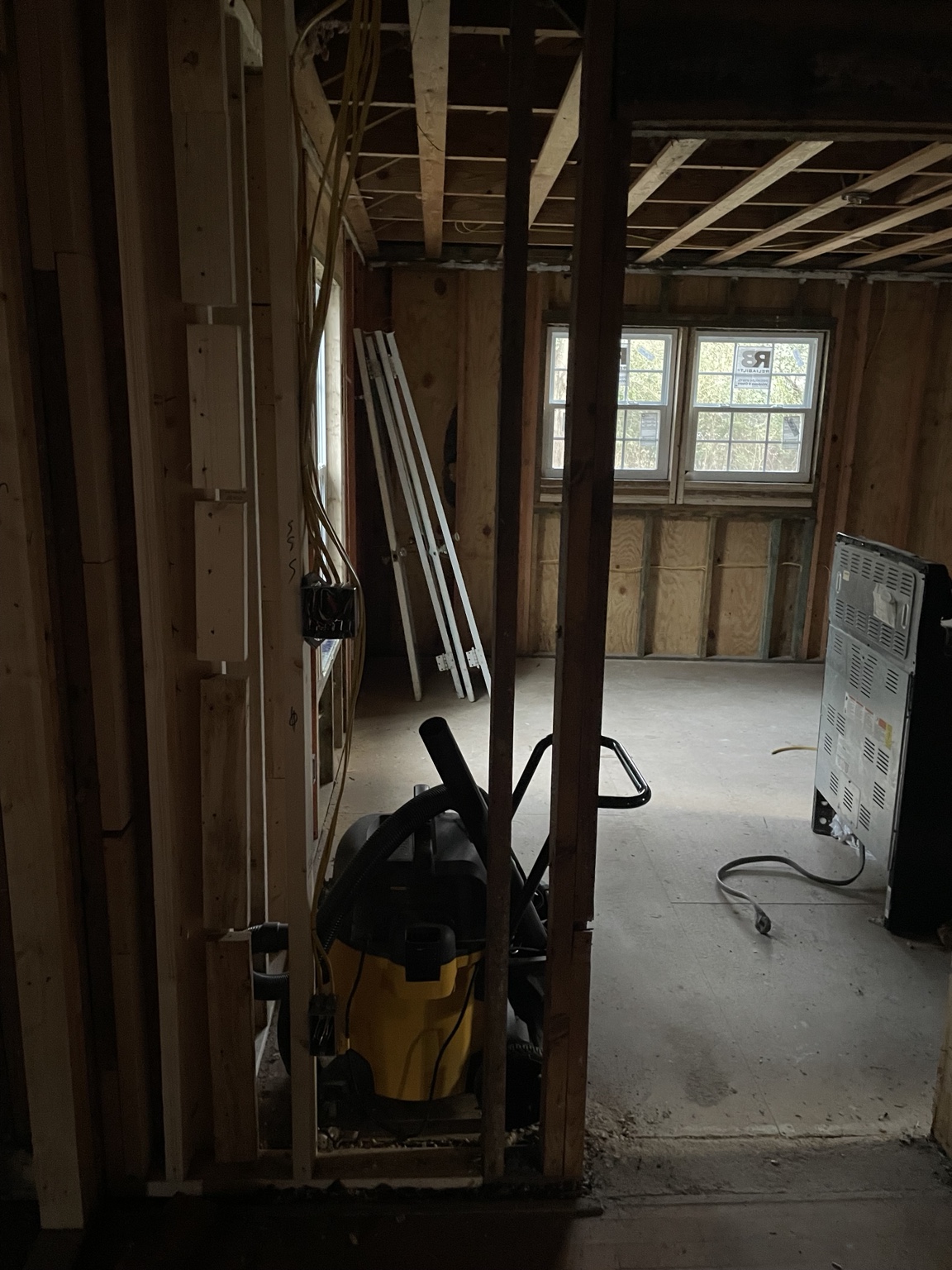 Open framed room during residential electrical rewiring