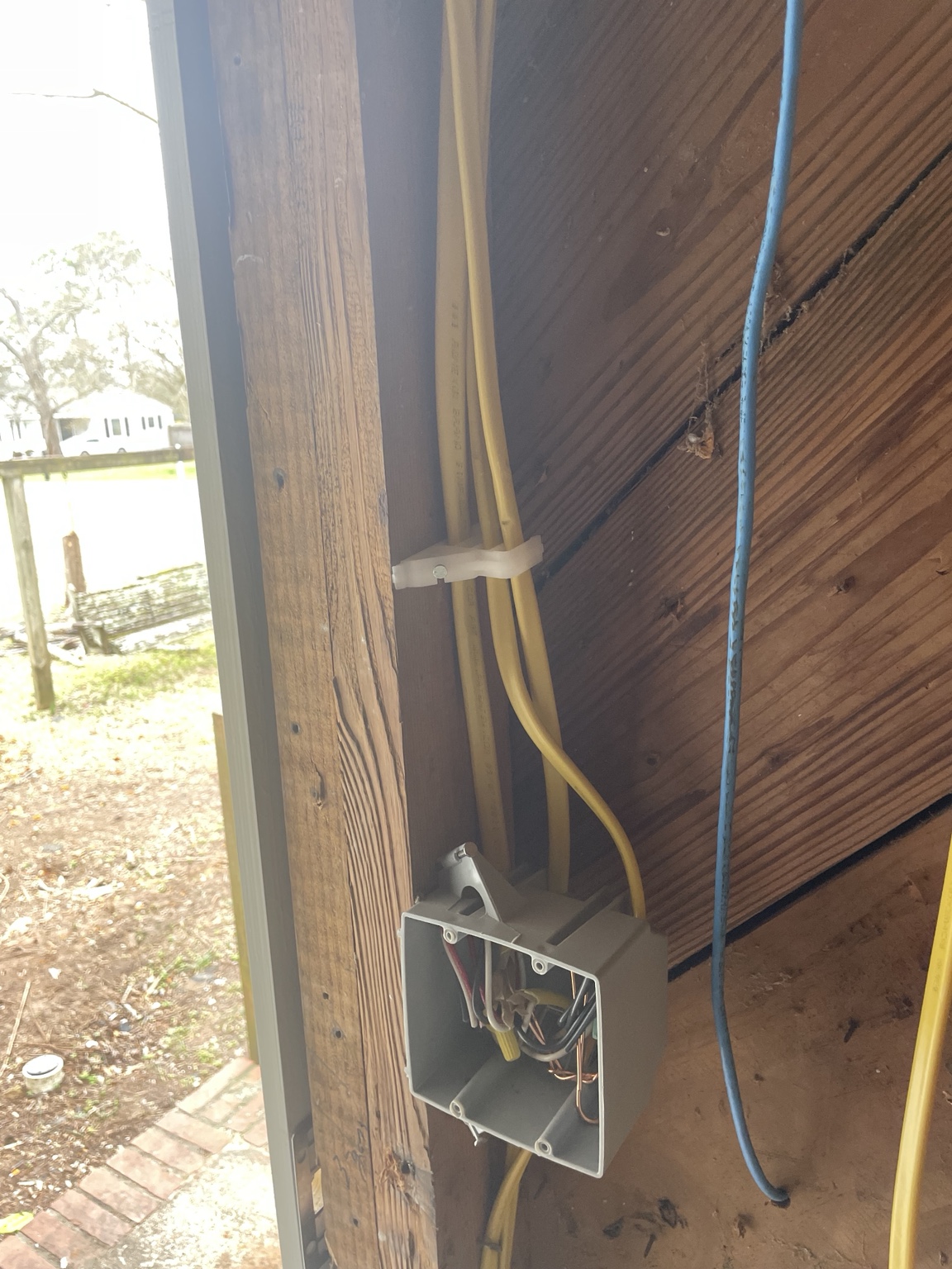 Electrical box and cable routing near exterior wall framing