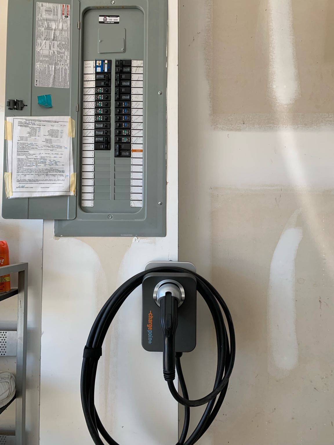ChargePoint EV charger installation below electrical panel