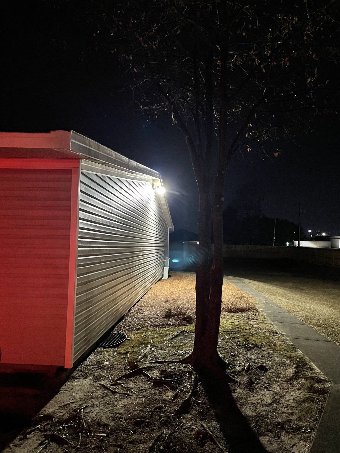 Exterior building lighting illuminating metal building